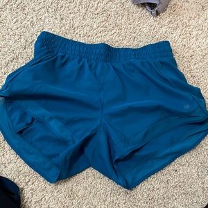 Athleta mesh racer 4 in inseam blue medium shorts